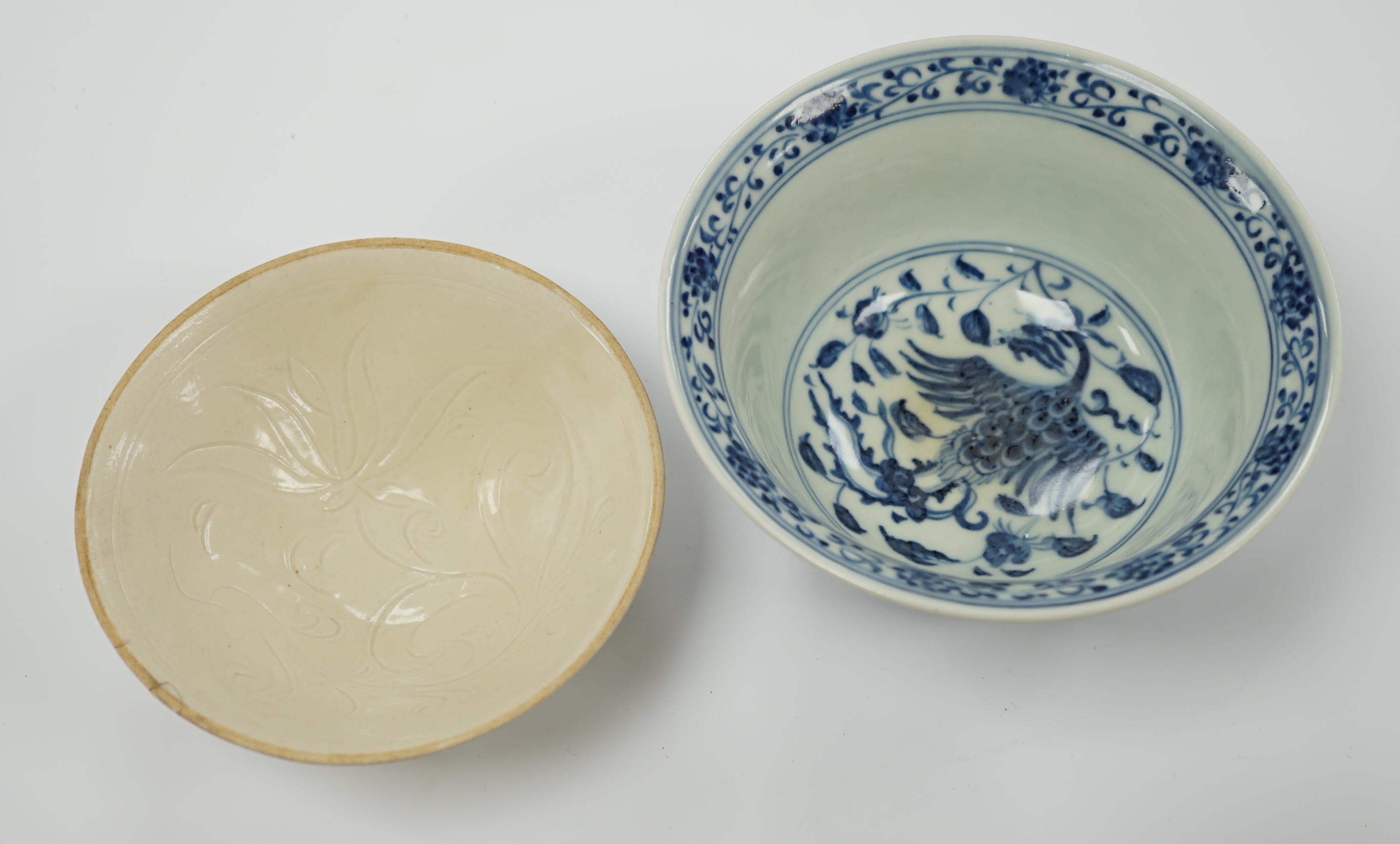 A Chinese blue and white porcelain bowl, Xuande mark but later and another bowl